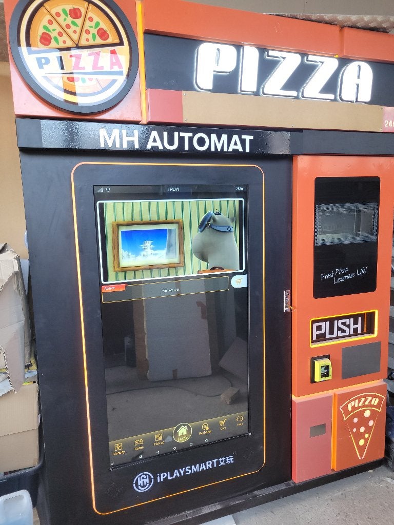 Distributeur a pizza, Ophalen