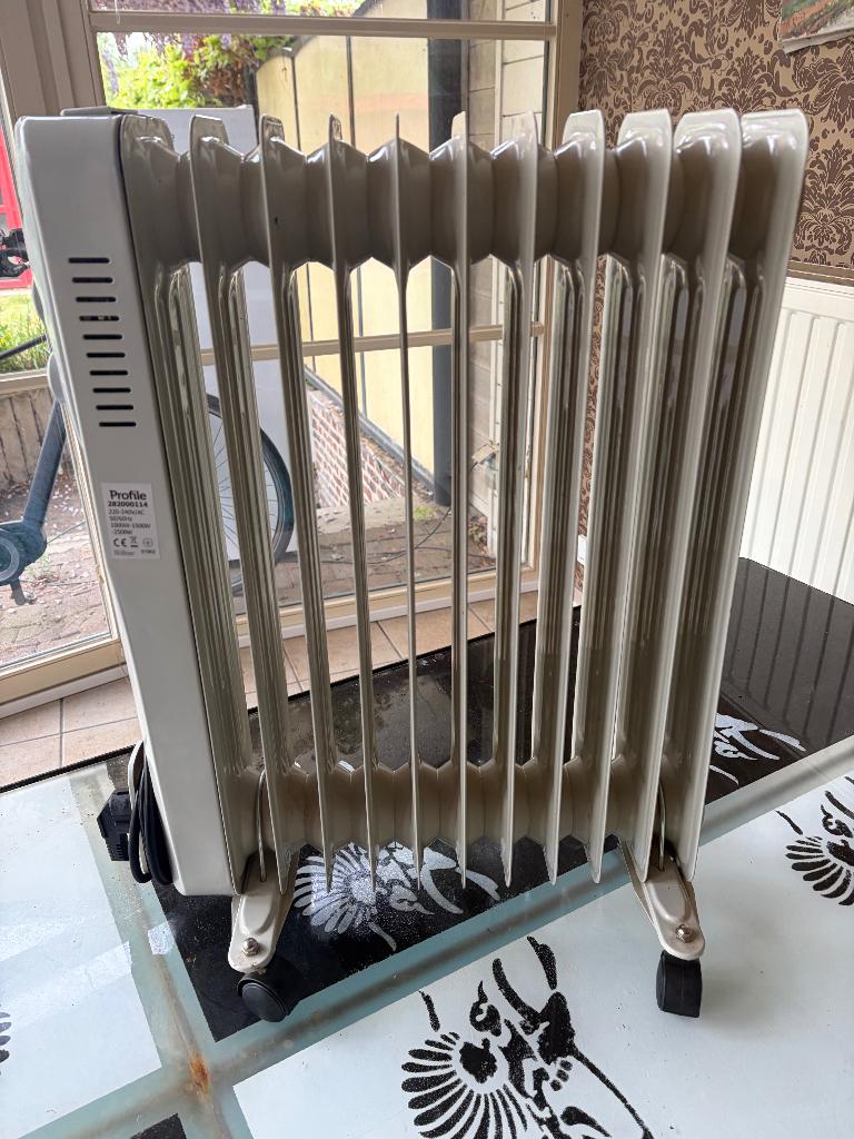 Radiatorkachel, 10 elementen, 2.500 Watt, Ophalen, Overige soorten, Elektrisch, Zo goed als nieuw