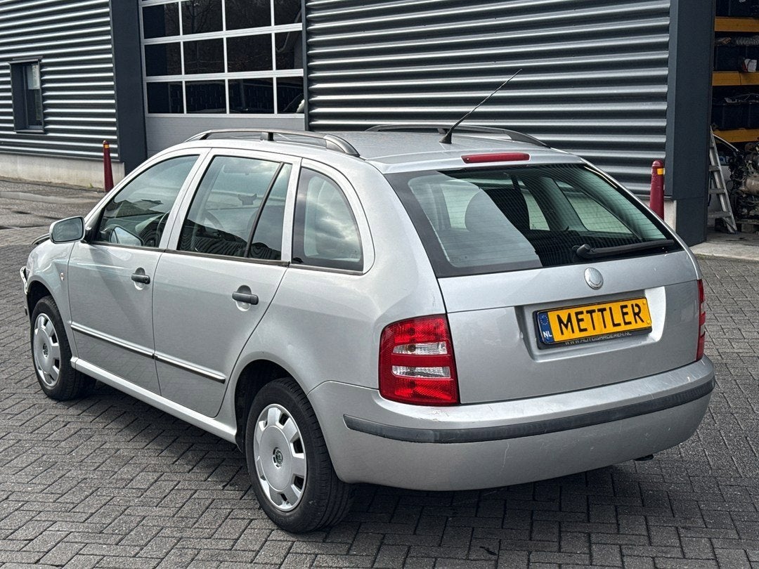 Skoda Fabia Combi 1.4-16V Comfort automaat, Auto's, Skoda, 450 kg, 4 cilinders, Startonderbreker, 180 g/km