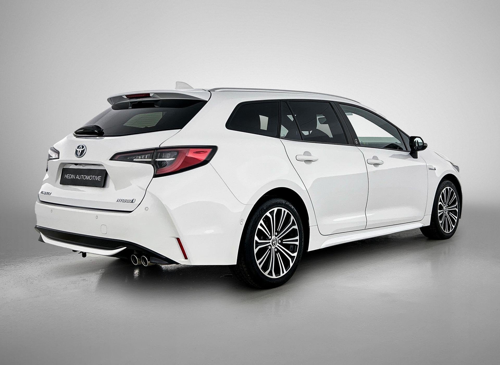 Toyota Corolla Touring Sports 2.0 Hybrid GR Sport e-CVT | Cl, Auto's, Dealer onderhouden, 750 kg, 4 cilinders, Wit