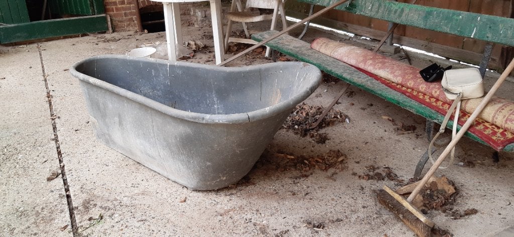 Antiek zinken ligbad, Ophalen