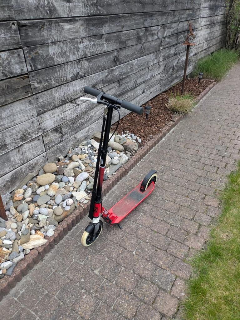 Oxelo mid 9 step met draagriem rood/zwart, Ophalen