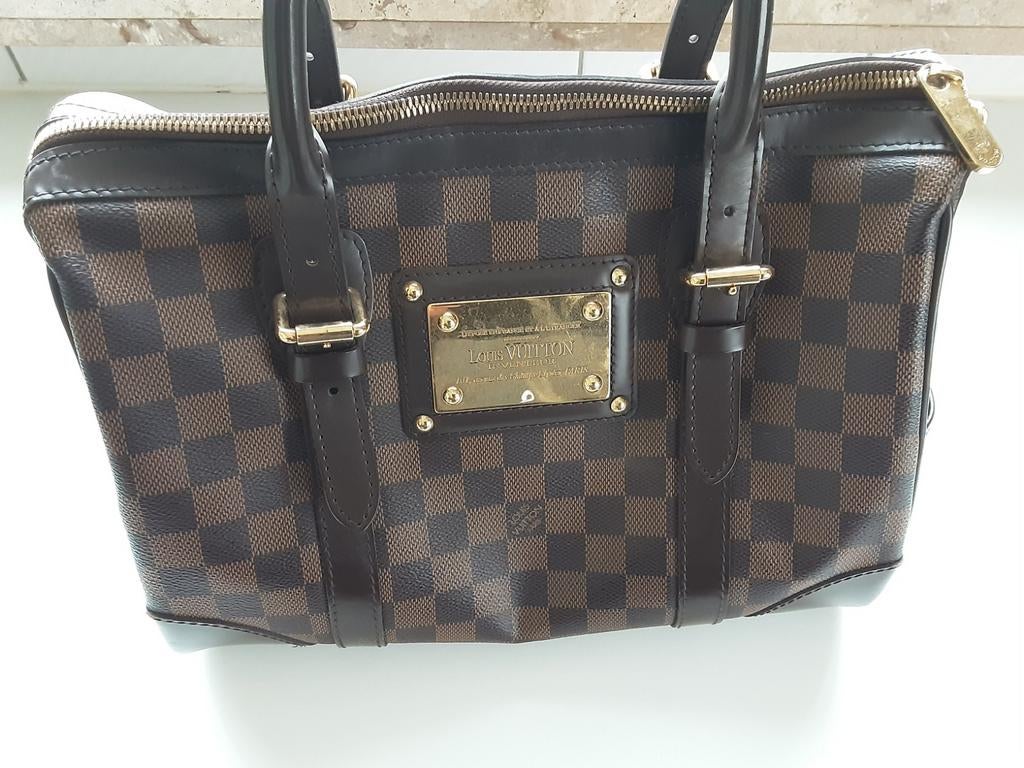 Louis vuitton handtas, Ophalen