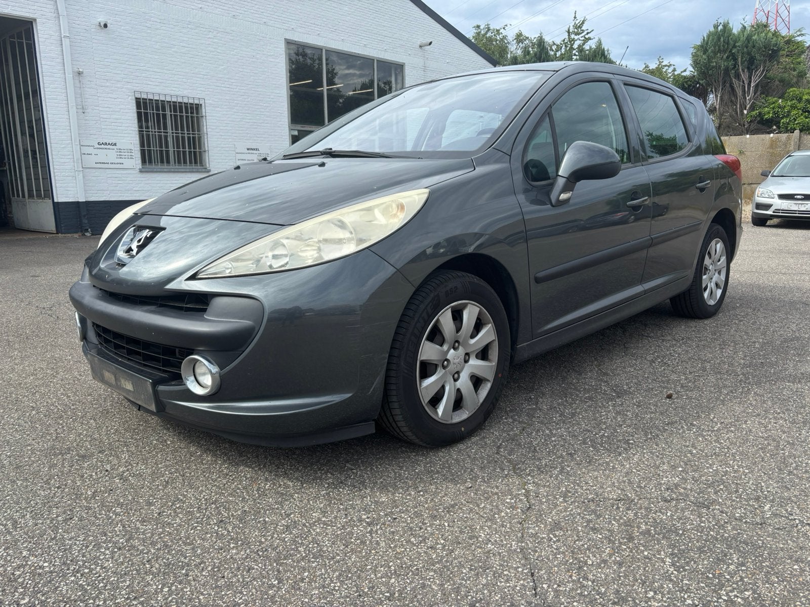 PEUGEOT 207SW 1.4İ *108000KM* GEKEURD MET CAR PASS, Auto's, Voorwielaandrijving, Zwart, 4 cilinders, 5 deurs