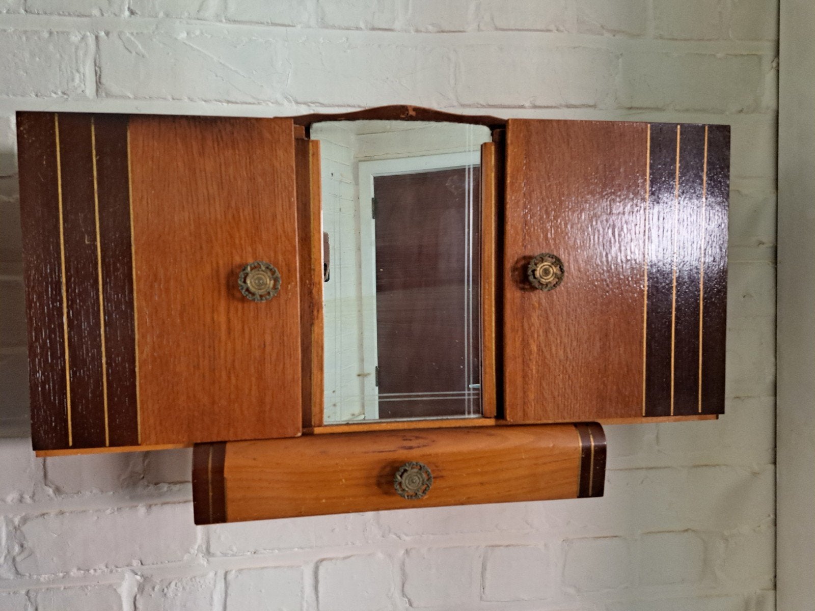 kleine hang kast, Ophalen
