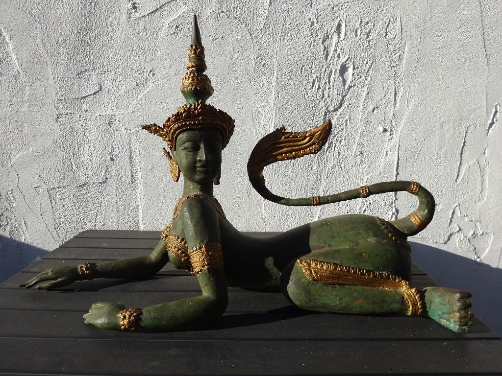 Bronzen beeld uit Thailand, Ophalen