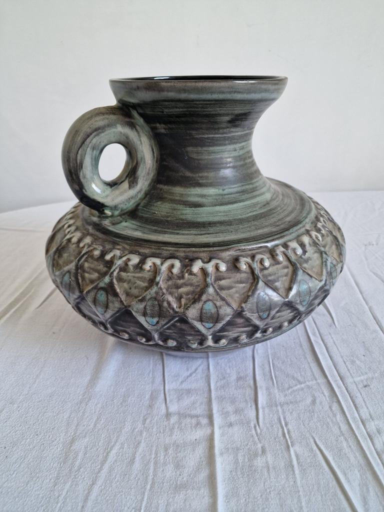 Vase poterie, Enlèvement