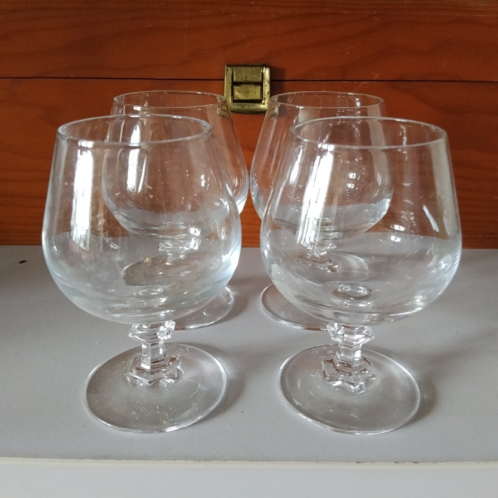 4 (cognac) glaasjes, Ophalen