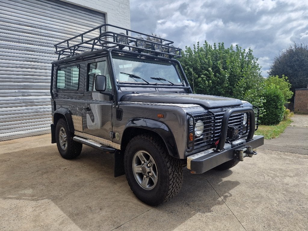 Land Rover Defender 90 Td5 TOM RAIDER, Autos, Achat, Entreprise, Boîte manuelle, Noir
