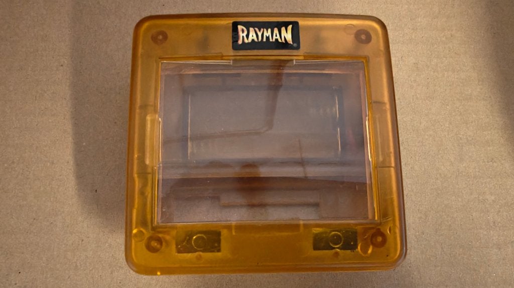 Loupe de poche/glacière Gameboy transparente Rayman, Consoles de jeu & Jeux vidéo, Enlèvement ou Envoi, Utilisé, Game Boy Color