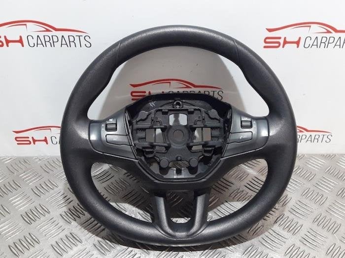 Volant d'un Peugeot 208, -, 3 mois de garantie, Utilisé, -
