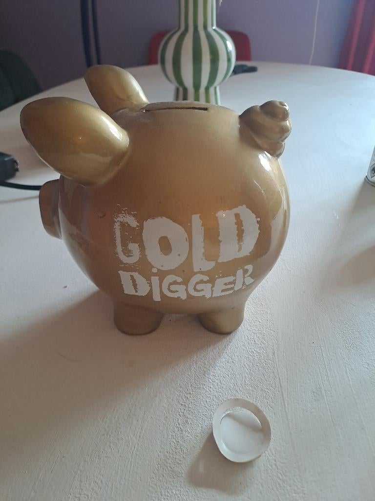 Golddigger spaarvarkentje, Ophalen, Gebruikt