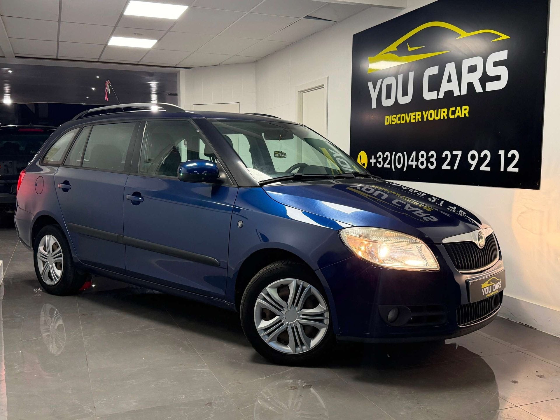 Skoda Fabia 1.4i Music 1 Jaar Garantie, Stof, Gebruikt, 4 cilinders, Blauw