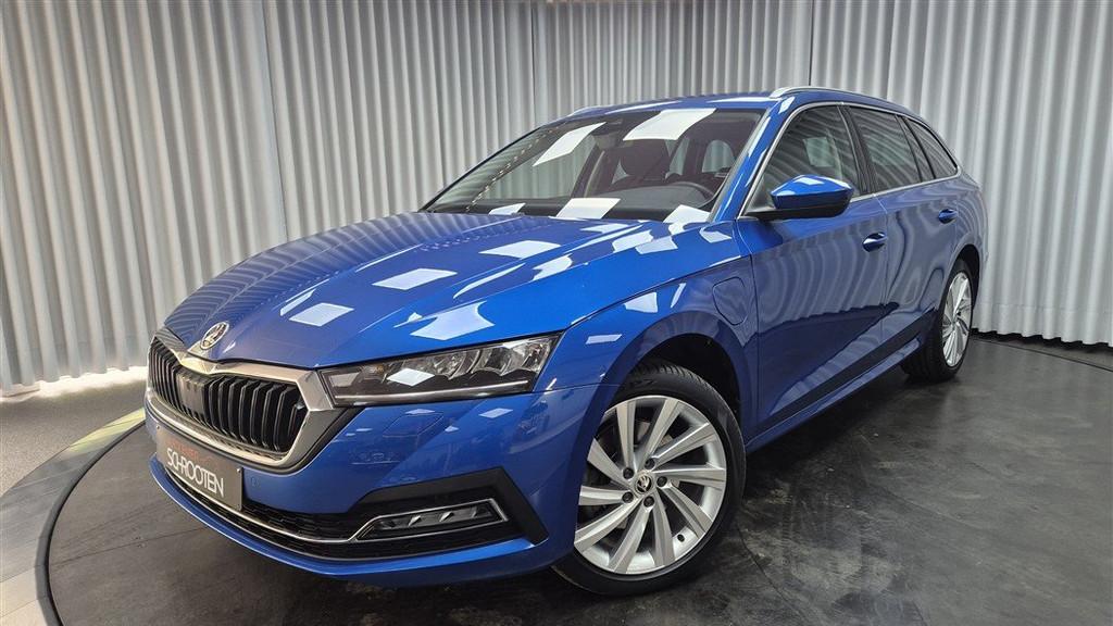 Skoda Octavia Combi iv 1.4 TSI (bj 2021, automaat), Auto's, Skoda, Stof, 4 cilinders, Blauw, 5 deurs