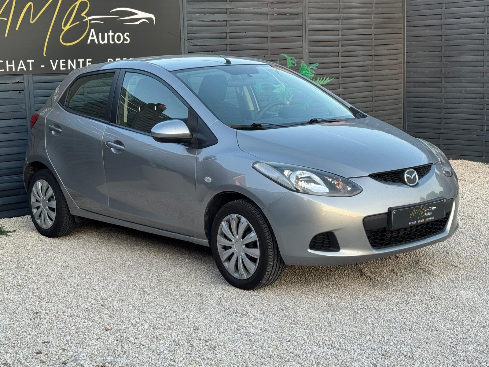 Mazda 2 1.4 Turbo CDVi */*CLIM+CARNET+VELGEN*/*, Stof, 50 kW, Zwart, 4 cilinders