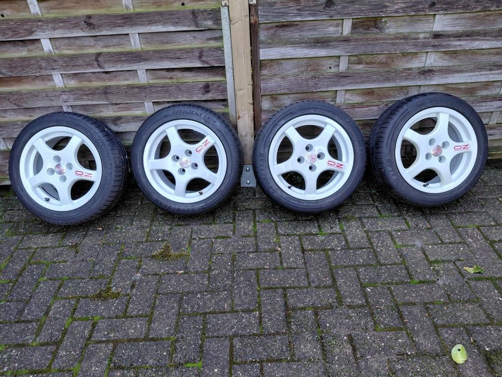 4 witte OZ Rally-Racing velgen 7JR15H2 met 4 nieuwe banden ., Auto-onderdelen, Banden en Velgen, Ophalen, Band(en)