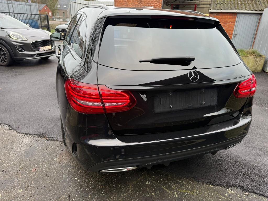 Mercedes C200 Break AMG Line, Auto's, Automaat, 4 cilinders, https://public.car-pass.be/vhr/4fd5ef66-f844-424c-b44e-35213a620d12?lang=nl