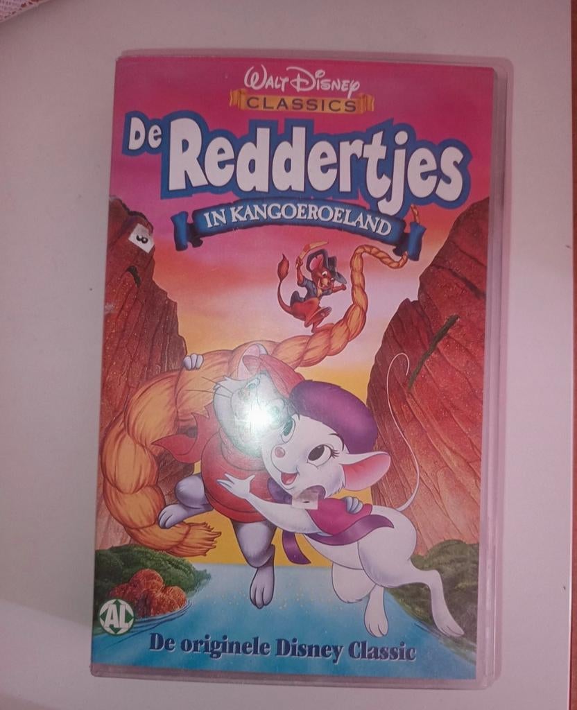 Cassette VHS "De reddertjes in kangoeroeland", Enlèvement ou Envoi, Dessin animé, Tous les âges, Comme neuf
