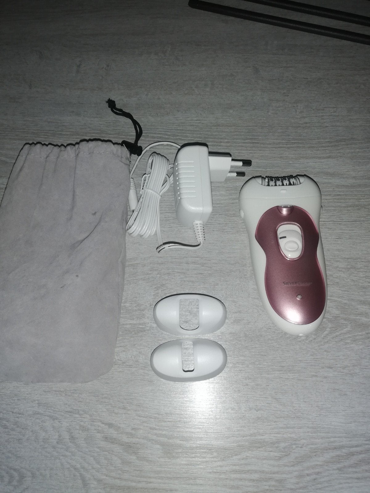 Epilateur avec chargeur, Ophalen