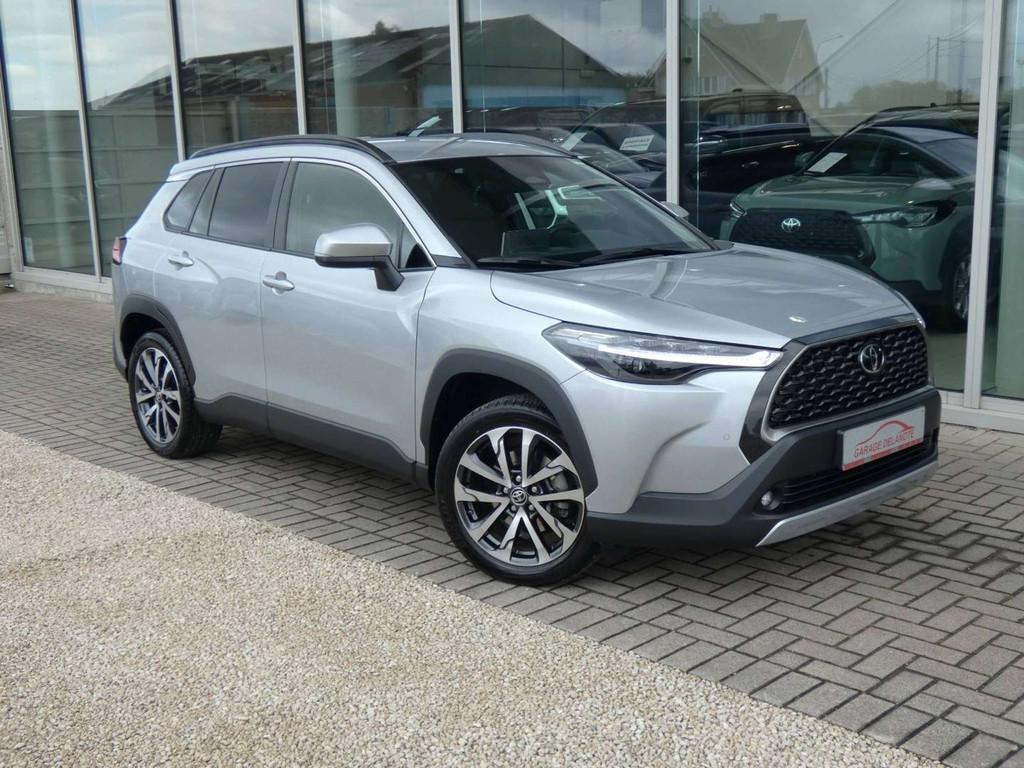 Toyota Corolla Cross 1.8 Hybrid 140pk STYLE +Dodehoek +Reser, Auto's, Stof, Gebruikt, Zwart, 4 cilinders
