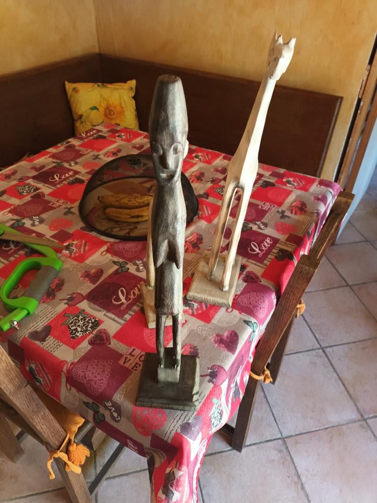 objet en bois girafes plus statue, Enlèvement