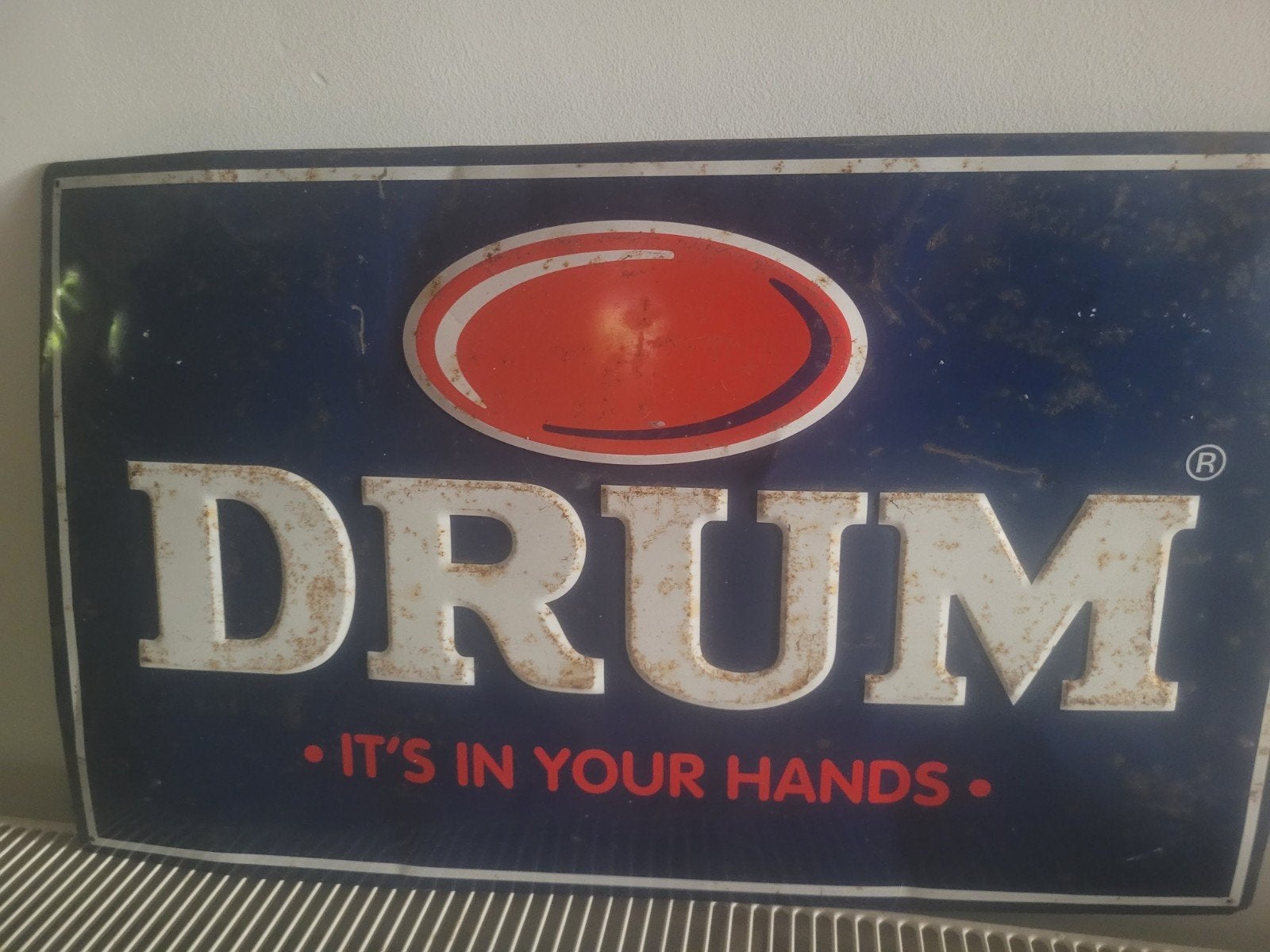 Plaque émaillée publicitaire Drum, Enlèvement