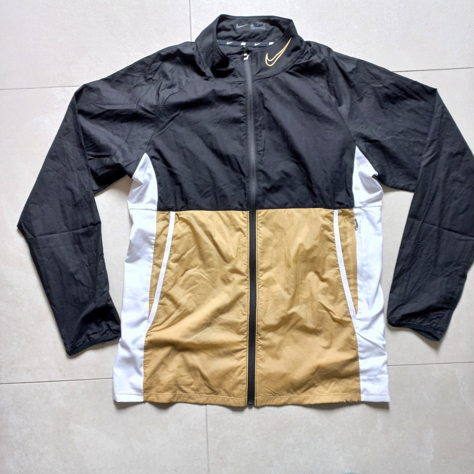 Veste de course ultra légère Nike taille L, Envoi, Course à pied, Nike
