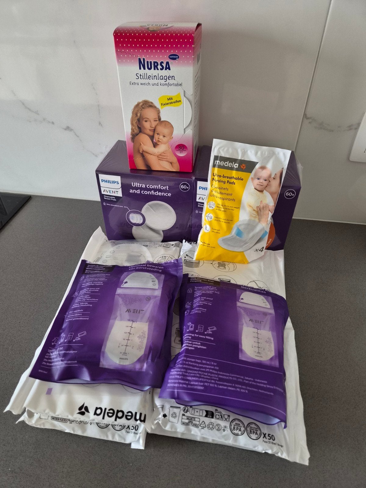 Moedermelk bewaarzakjes en borstcompressen, Ophalen, Medela