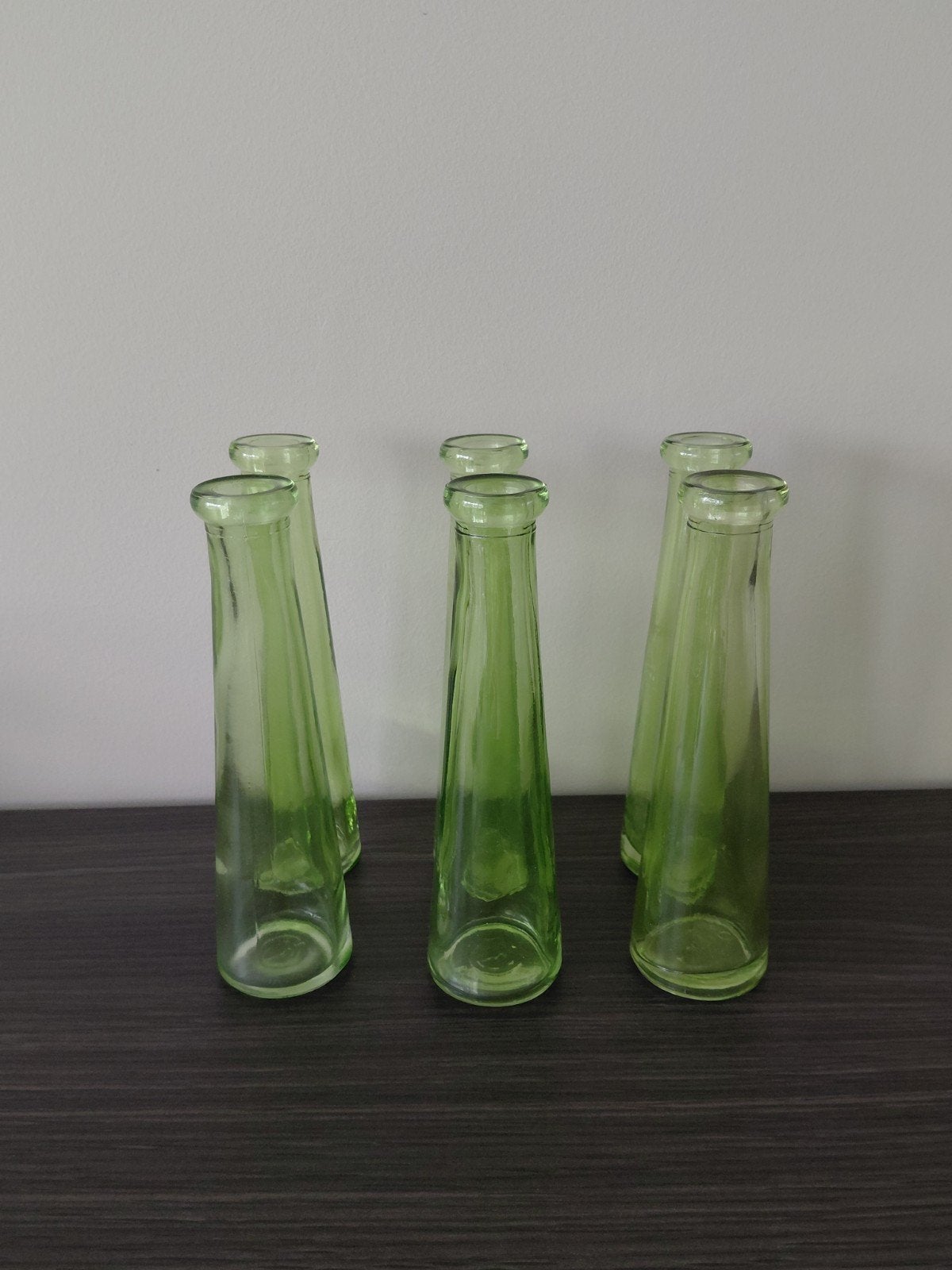 6 kleine vaasjes, Ophalen
