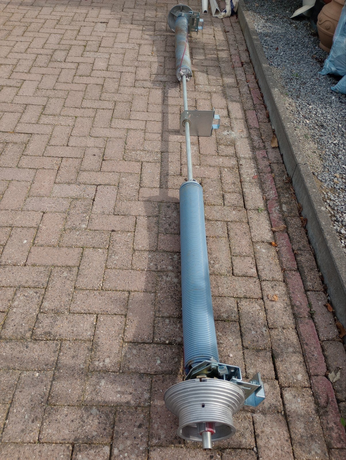 torsieveer garagepoort, Enlèvement