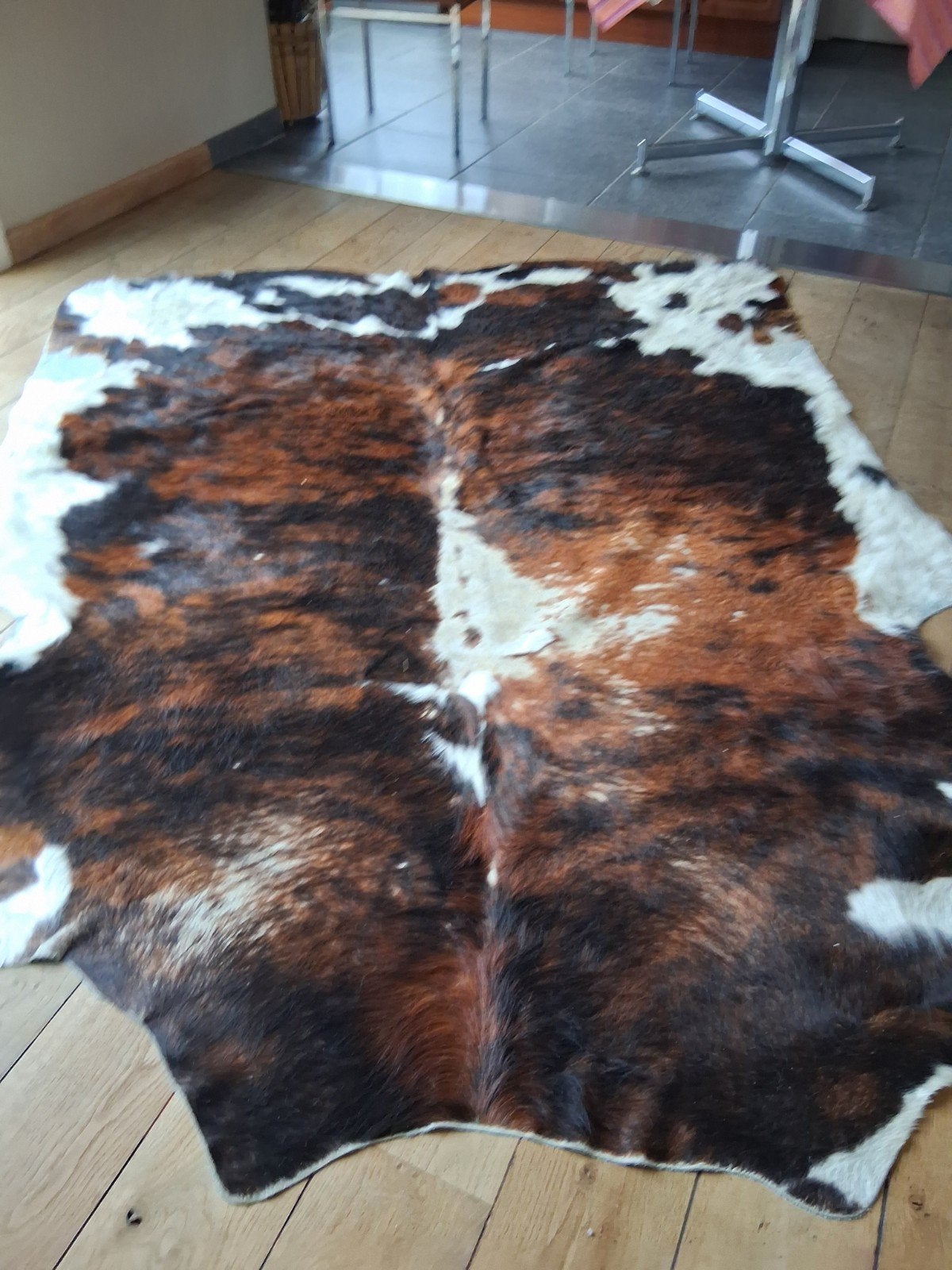 Koehuid tapijt, Ophalen
