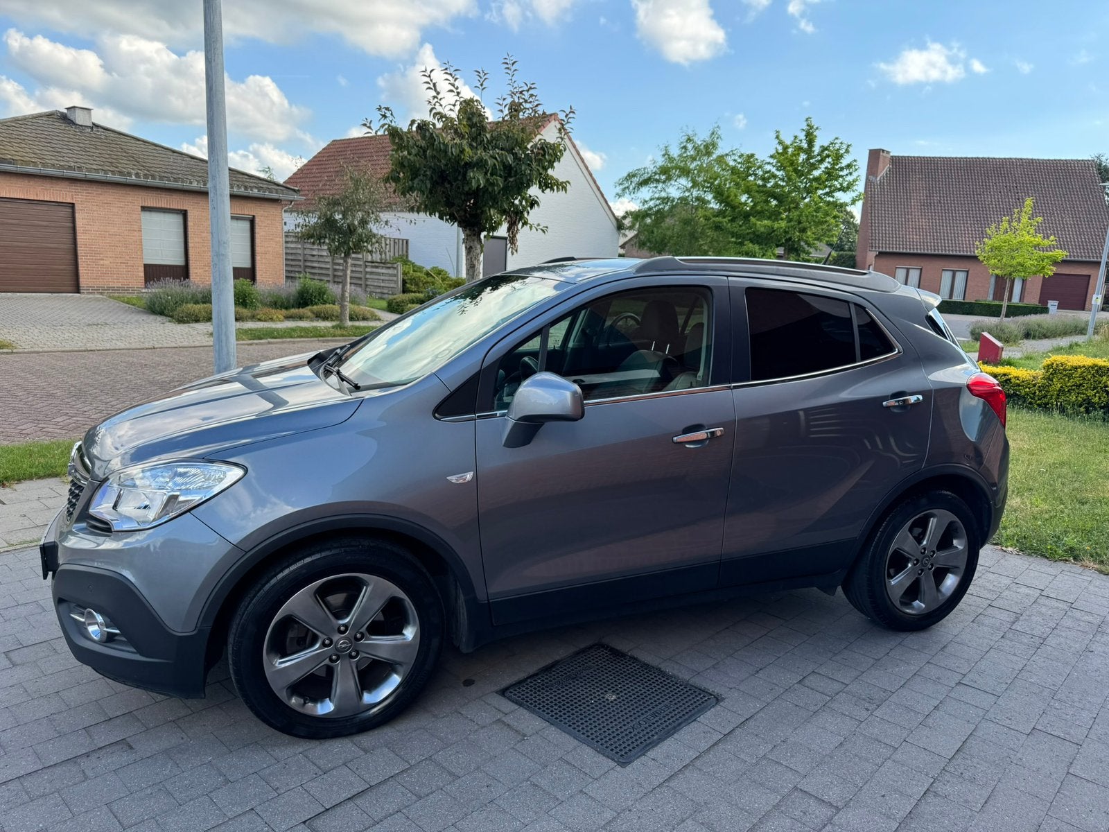 Opel Mokka 1.6 benzine, Auto's, Voorwielaandrijving, Verwarmde buitenspiegels, Zwart, 4 cilinders