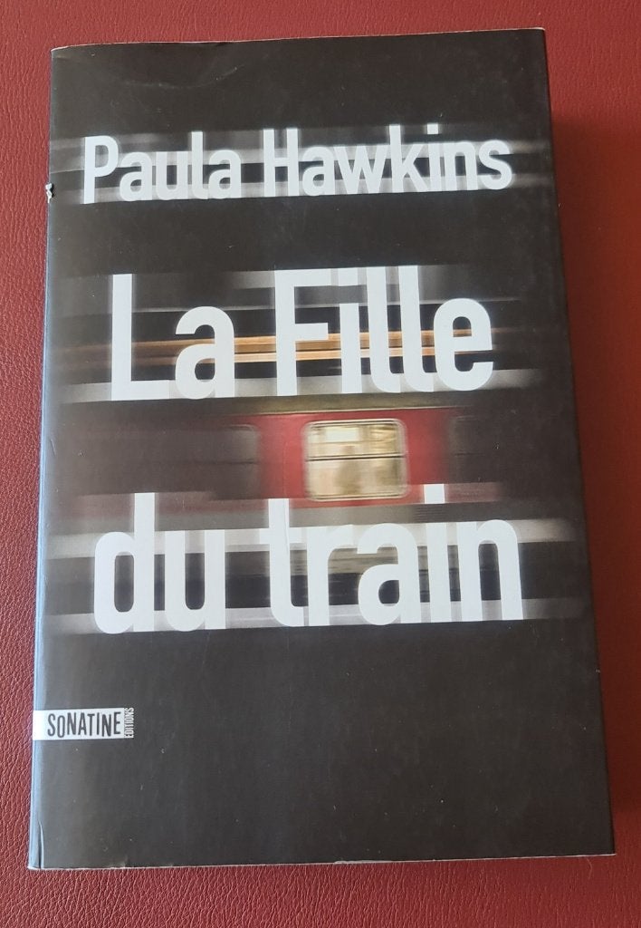 La File du train - Paula Hawkins, Ophalen of Verzenden, Zo goed als nieuw