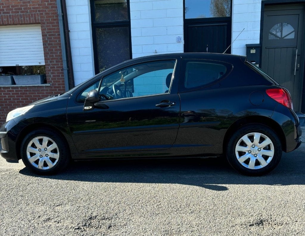 Peugeot 207 1.4 essence 2007, Autos, Rouge, Achat, Noir, 5 places