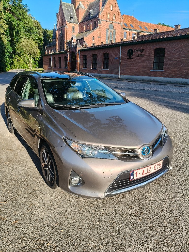Toyota Auris TS hybride, Euro 5, Leder en Stof, 345 kg, Dealer onderhouden