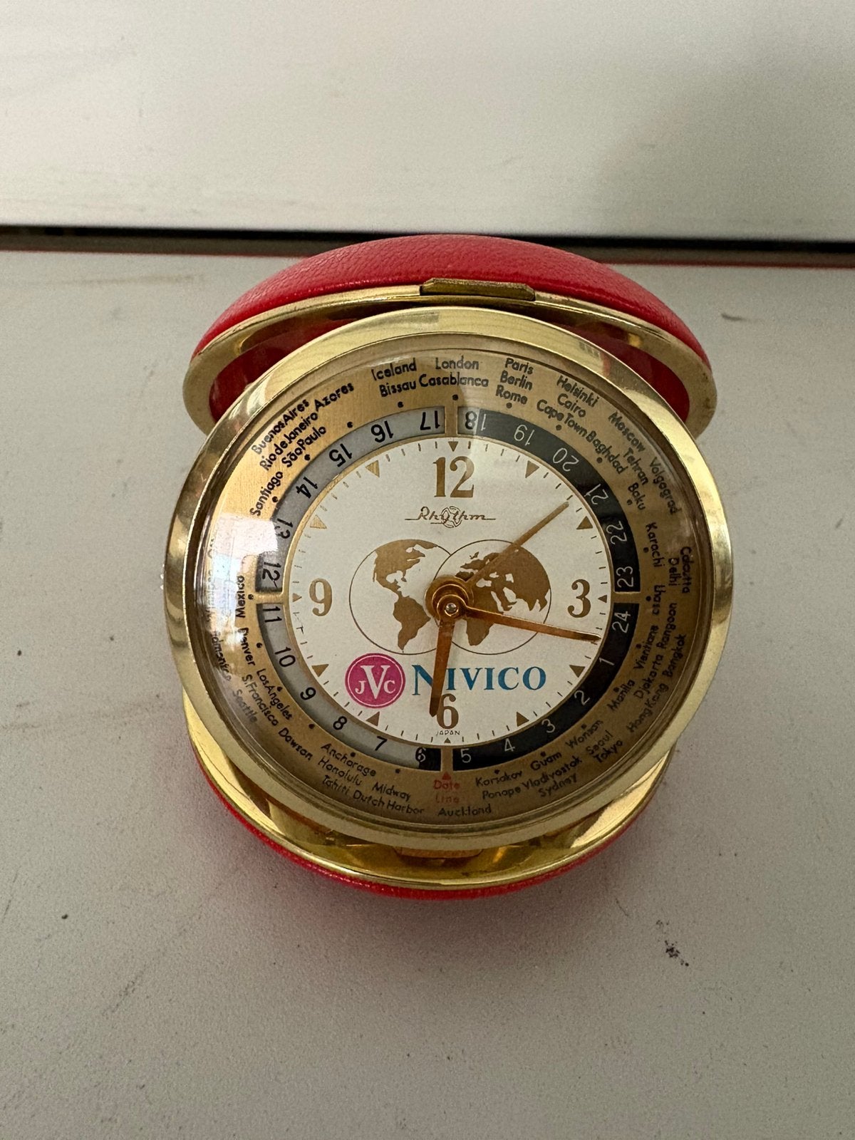 Ancien réveil de voyage Rhythm “World Time” JVC NIVICO - 70s, Enlèvement ou Envoi, Comme neuf