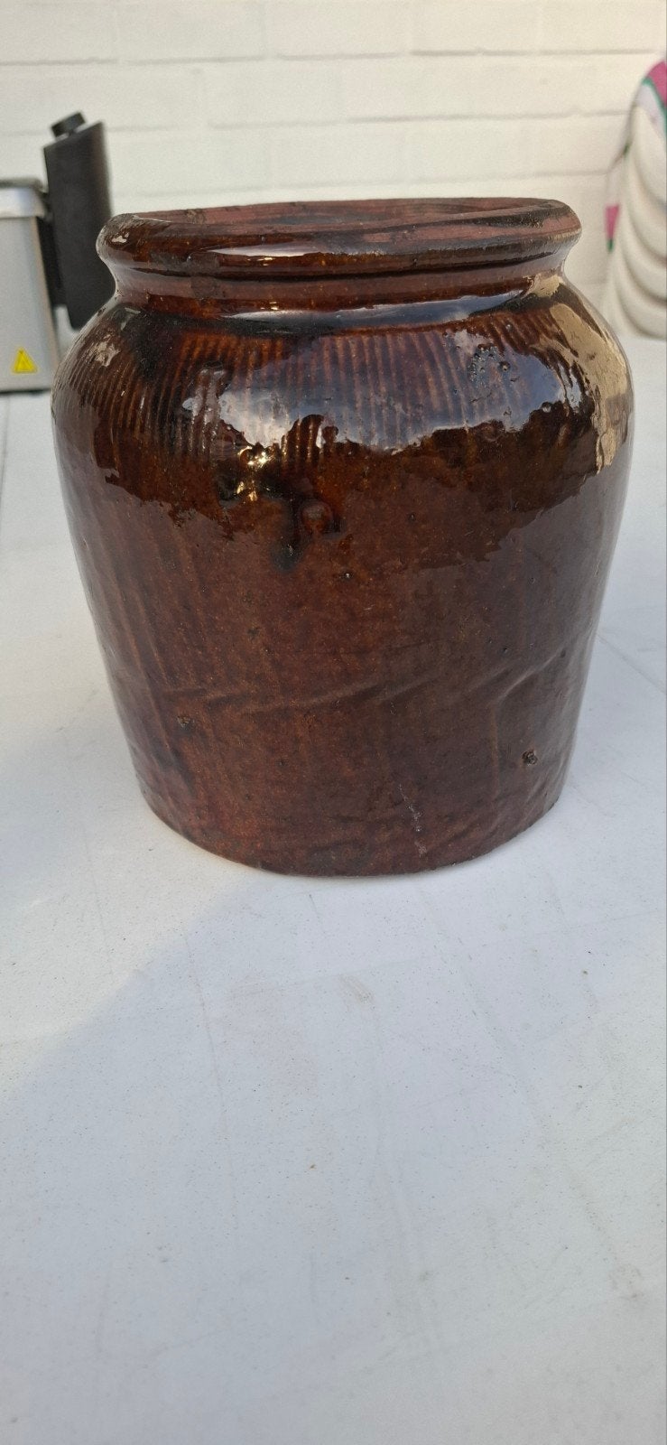 Oude mosterdpot, Ophalen