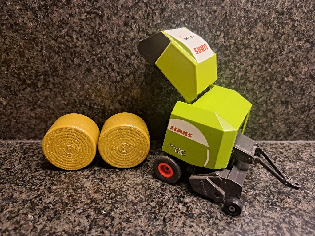Siku 1/32 balenpers Claas Rollant 340, Ophalen of Verzenden, Zo goed als nieuw, Tractor of Landbouw, SIKU