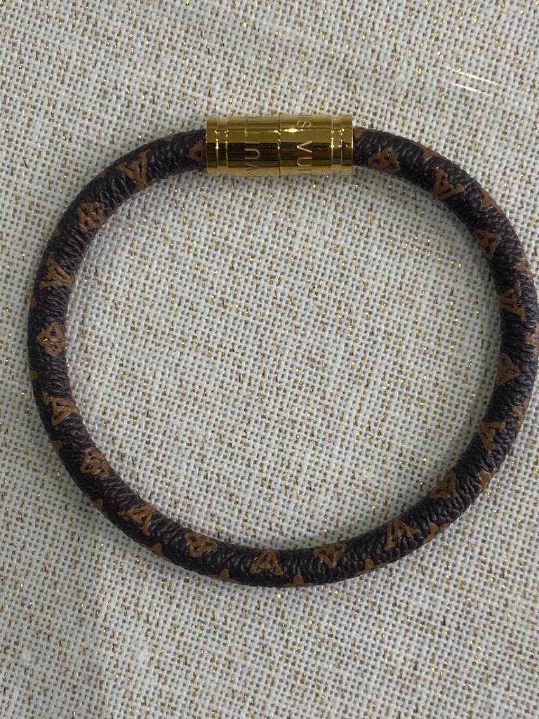 Bracelet Louis Vuitton cordon marron/noir – Neuf, Neuf, Enlèvement ou Envoi, Avec strass, Or