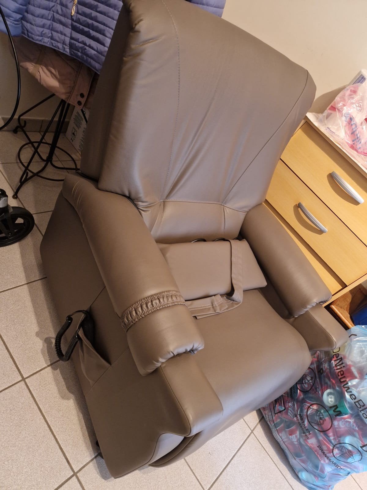 Electrische relaxzetel revilax, Ophalen