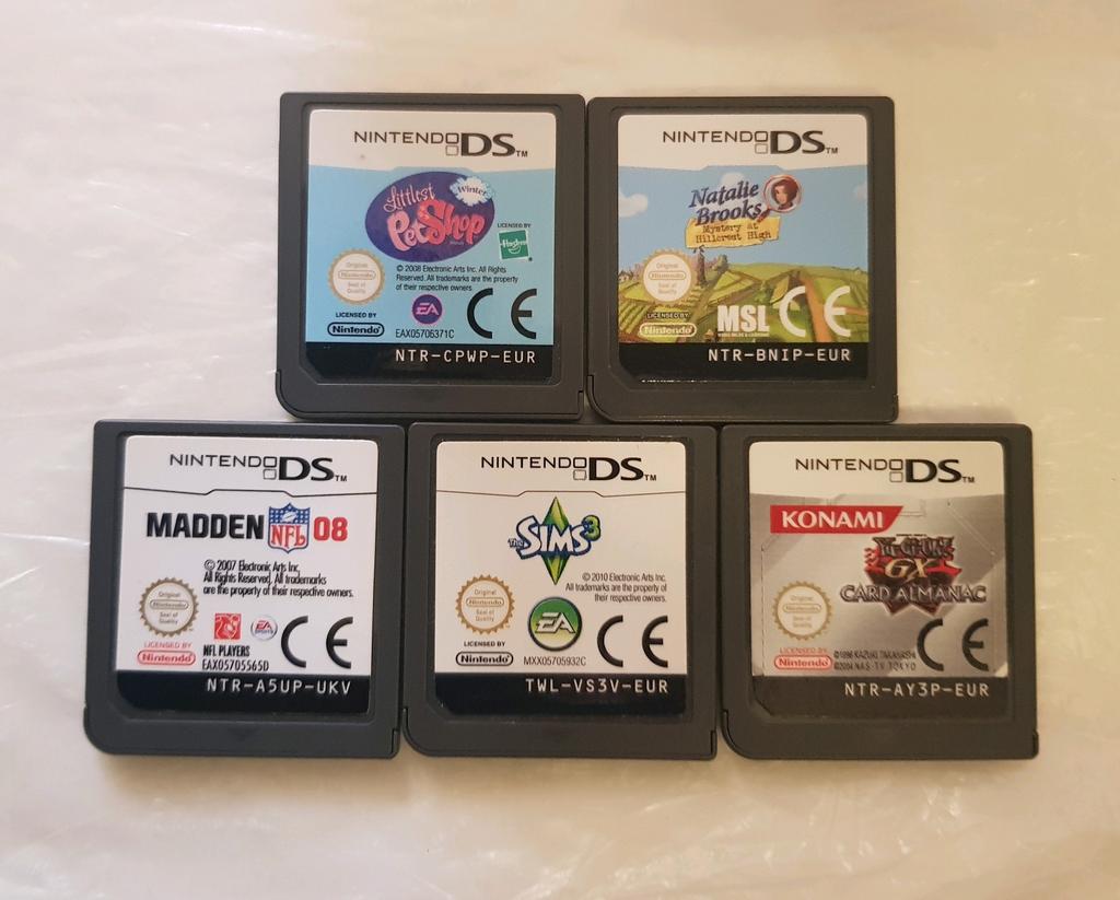 Set van 5 sims2-spellen, petshop...