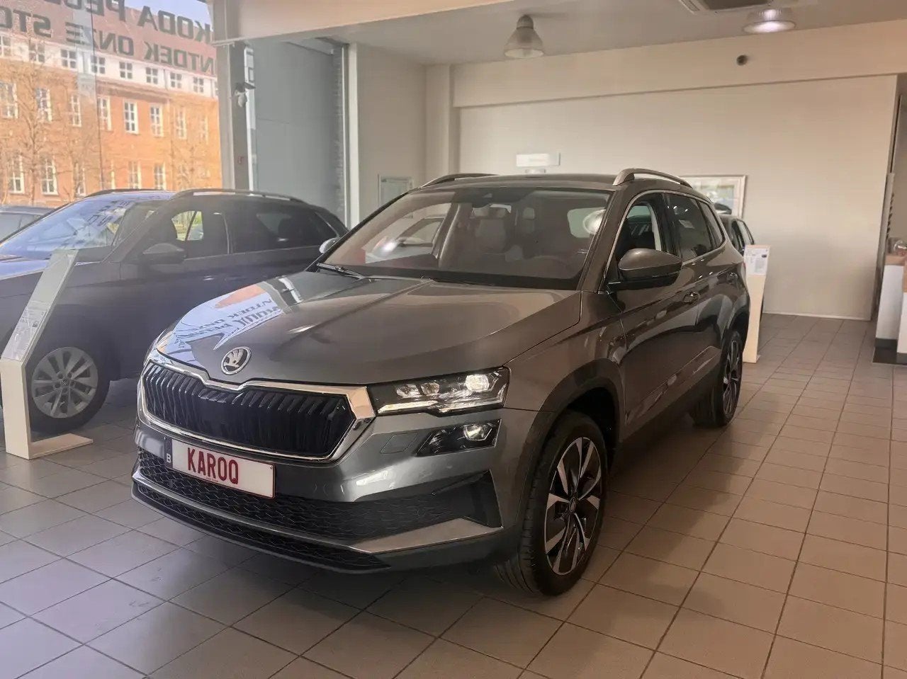 Skoda Karoq 1.5 TSI Corporate (automaat), Auto's, Automaat, 110 kW, Overige kleuren, Leder en Stof