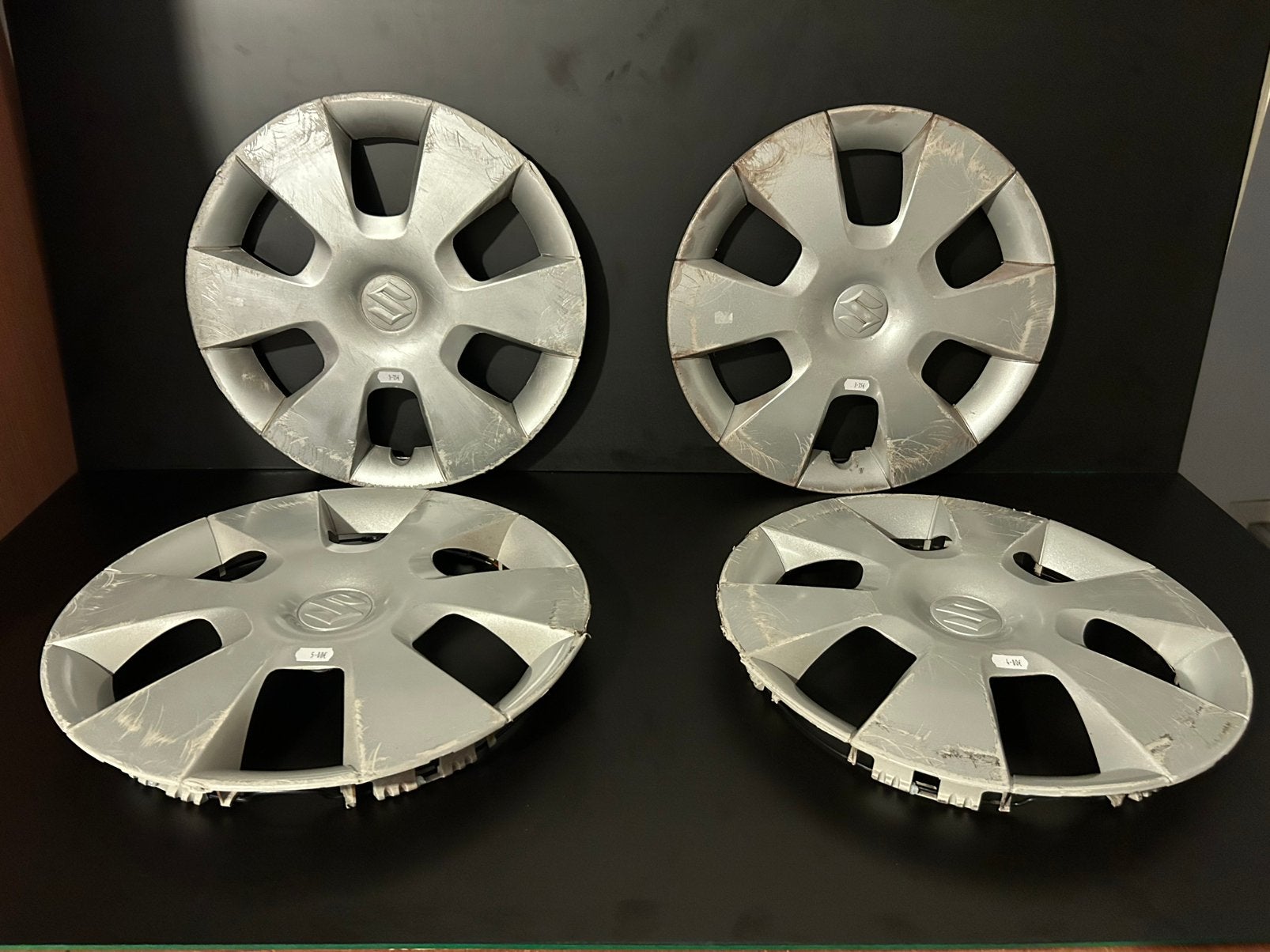 4 originele Suzuki alto 14" wieldoppen, Ophalen of Verzenden, Gebruikt