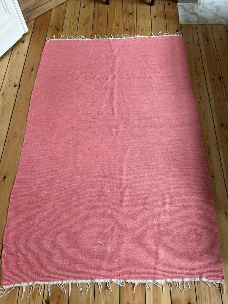 Roze tapijt, Ophalen
