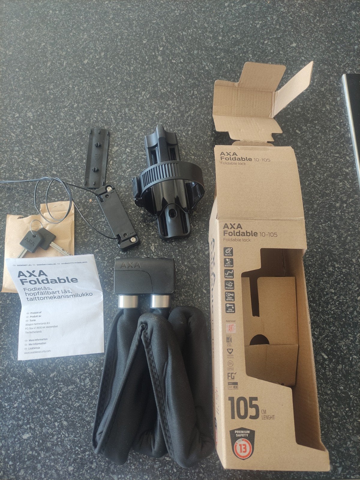 Axa foldable 10-105 zo goed als nieuw, Vélos & Vélomoteurs, Accessoires vélo | Cadenas de vélo, Enlèvement ou Envoi, Comme neuf