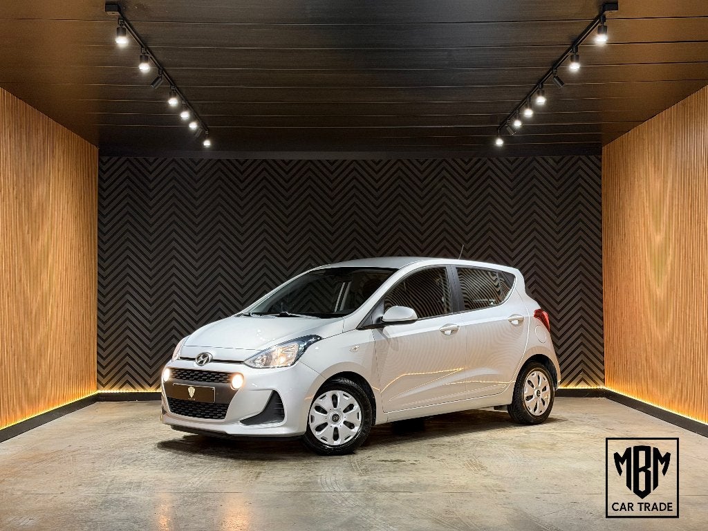 ✅ Hyundai i10 1.0i 12 Maand GARANTIE Airco CruiseC Bluetooth, Auto's, Voorwielaandrijving, Dealer onderhouden, Stof, Bedrijf