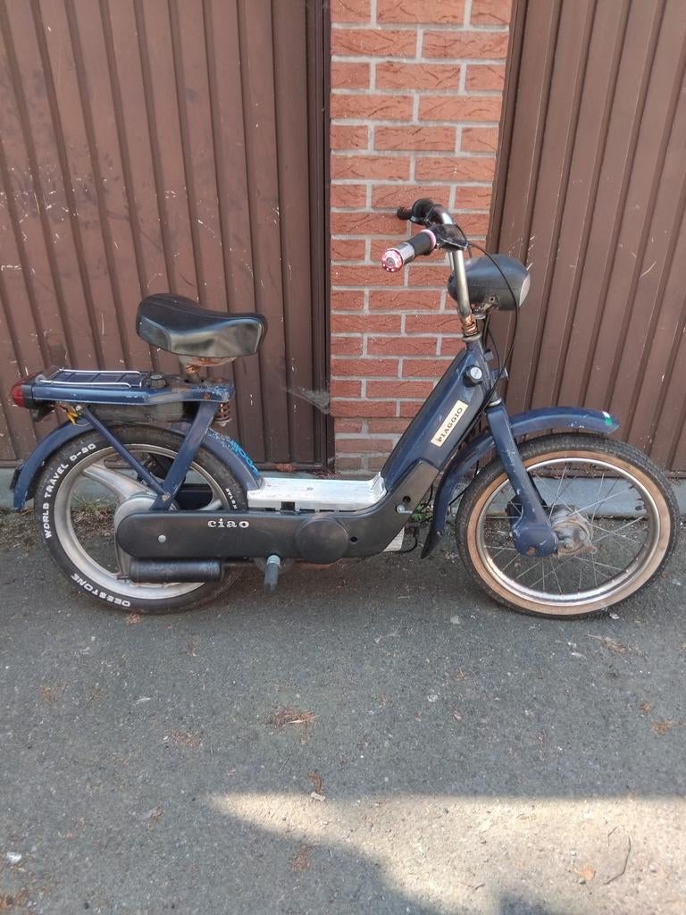 Piaggio Ciao conduit avec des journaux pour s'abonner, Enlèvement