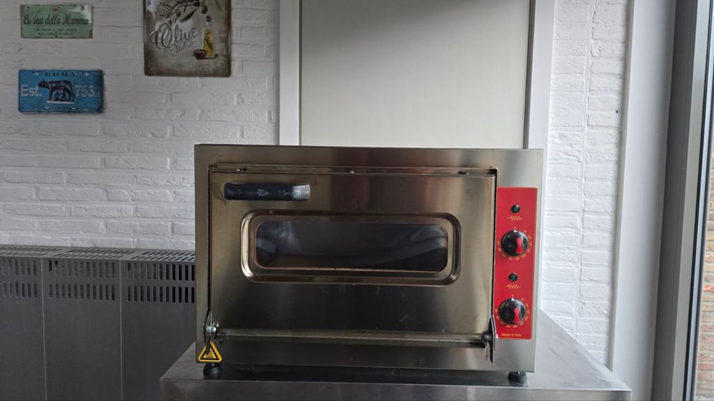 Elektrische oven voor pizza en brood, weinig gebruikt., Tuin en Terras, Pizzaovens, Ophalen