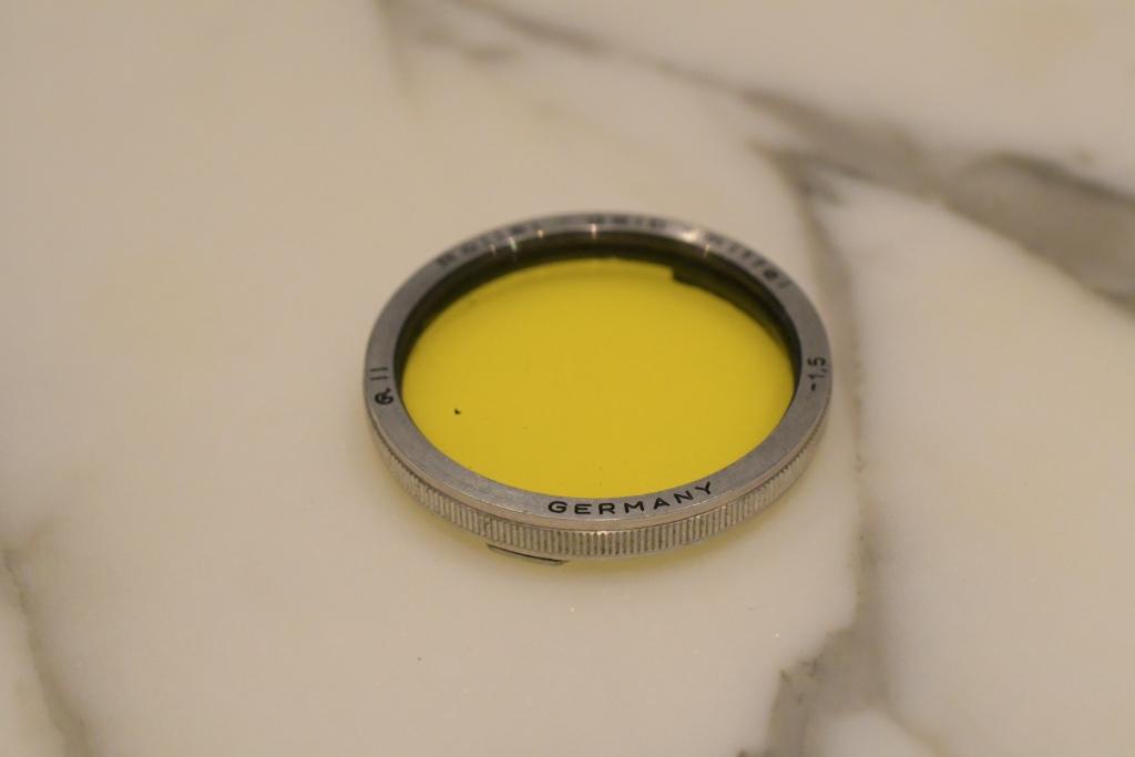 Filtre jaune Rollei Bayonet II dans un étui., Autres marques, Enlèvement ou Envoi, Utilisé, Autres types