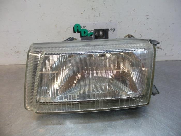 Phare gauche d'un Volkswagen Caddy (Caddy 95-), Volkswagen, -, 3 mois de garantie, Utilisé